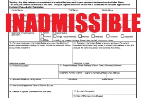 the words inadmissible stamped in red over application for immigrant visa and alien registration