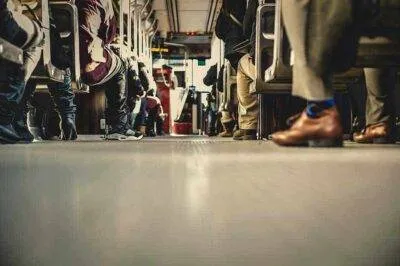 Picture of people sitting inside a bus.